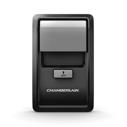 A Chamberlain garage door button with a large gray top that can be flipped up to reveal additional hidden buttons